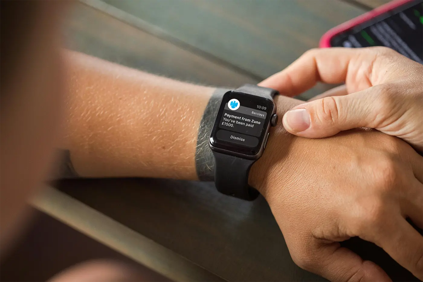 A notification on a Apple watch showing that they have been paid